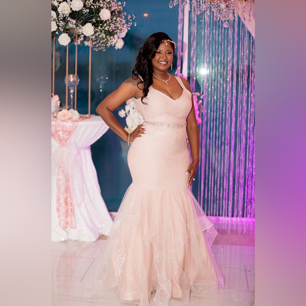 Bandage mermaid trumpet gown with horsehair trim.